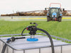 GPI P-120H-2UR Chemical Transfer Pump mounted to tank in front of crop field sprayer