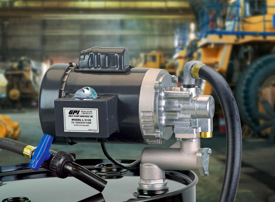 GPI L5132 heavy duty oil transfer pump with dispensing house and ball valve nozzle mounted on an oil tank