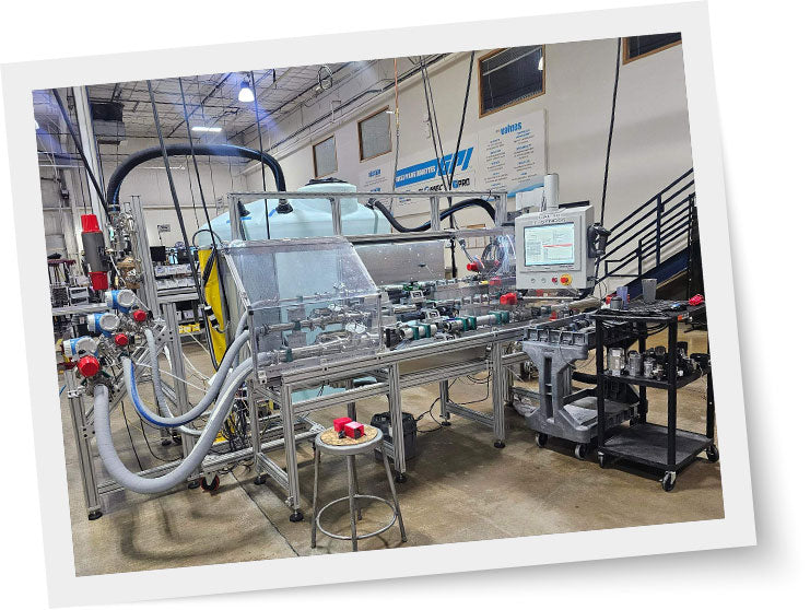 Industrial machine setup in a factory environment with various components and equipment.