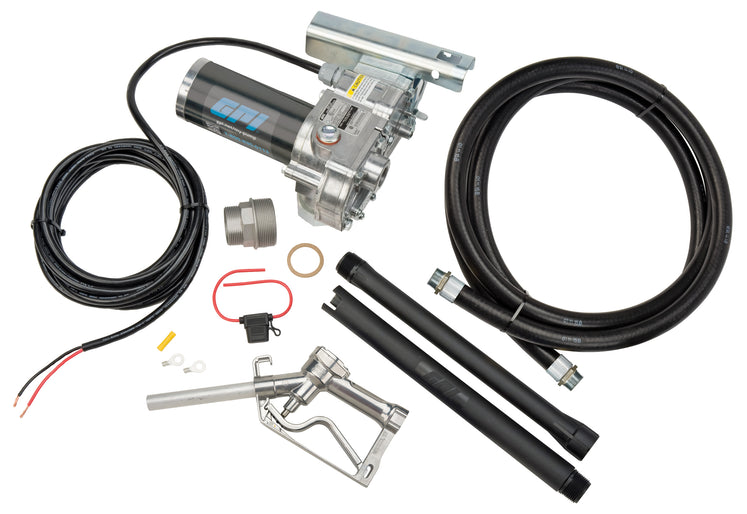 Content shot with M-240 Fuel transfer pump with factory installed power cord, fuel hose, manual shut-off nozzle, adjustable suction pipe, replaceable fuse, and tank bung adapter.