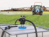 GPI P-200H-2UR Chemical Transfer Pump mounted to tank in front of crop field sprayer