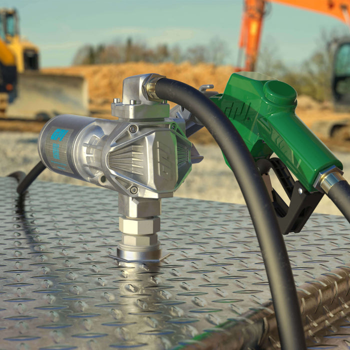 GPI G20 Fuel transfer pump with automatic shut-off diesel nozzle, fuel hose, and factory installed power cord on a tank at a construction site.